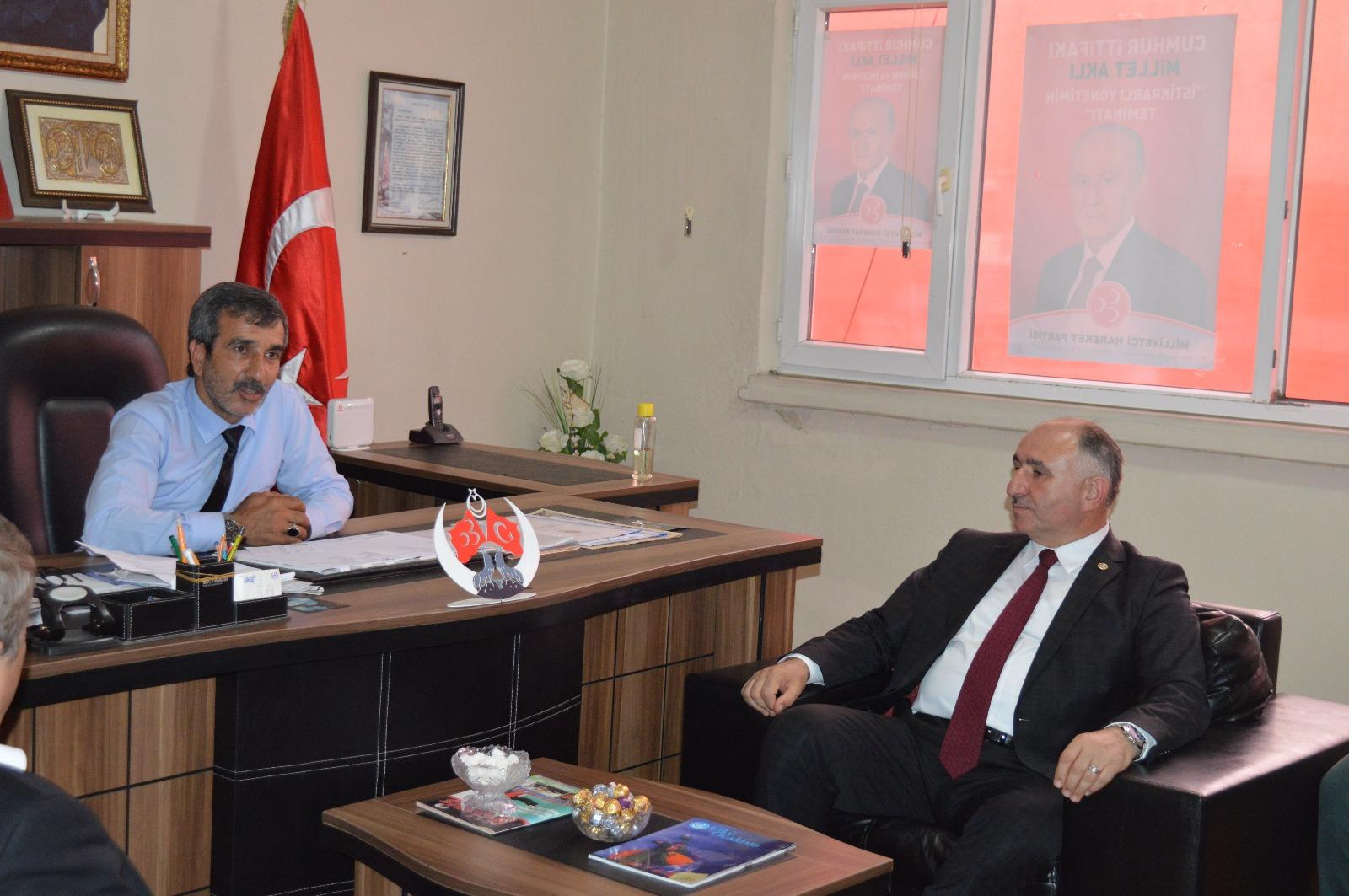 BAŞKAN ÇAĞLAYAN VE AK PARTİ TEŞKİLATI'NDAN MHP İLÇE YÖNETİMİNE ZİYARET 